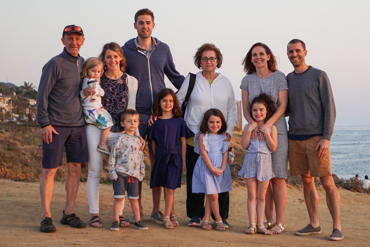 Family photo at sunset beach